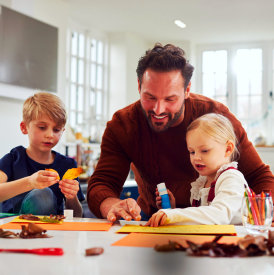 children doing a project with their teacher
